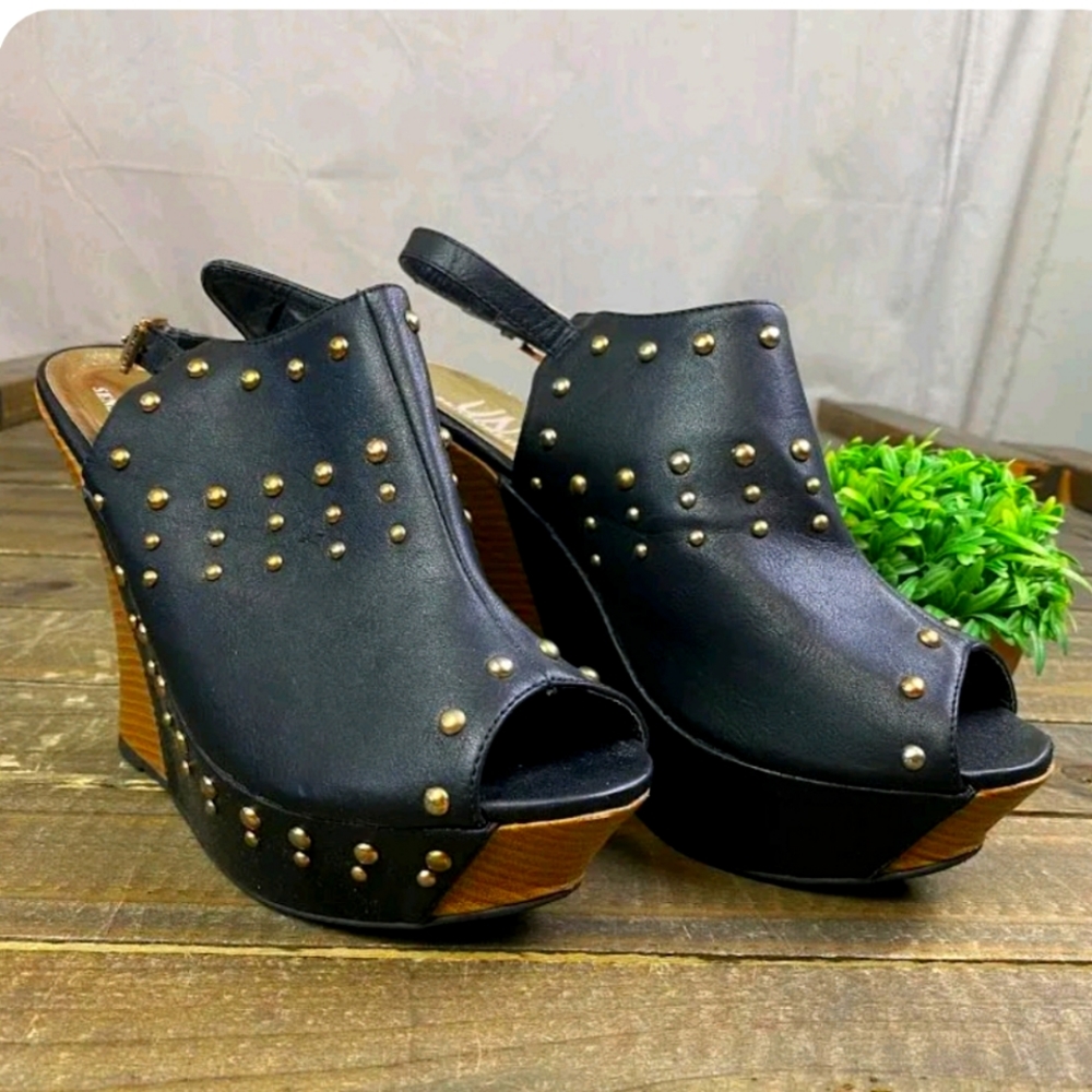 Studded Fox leather platform wedges.